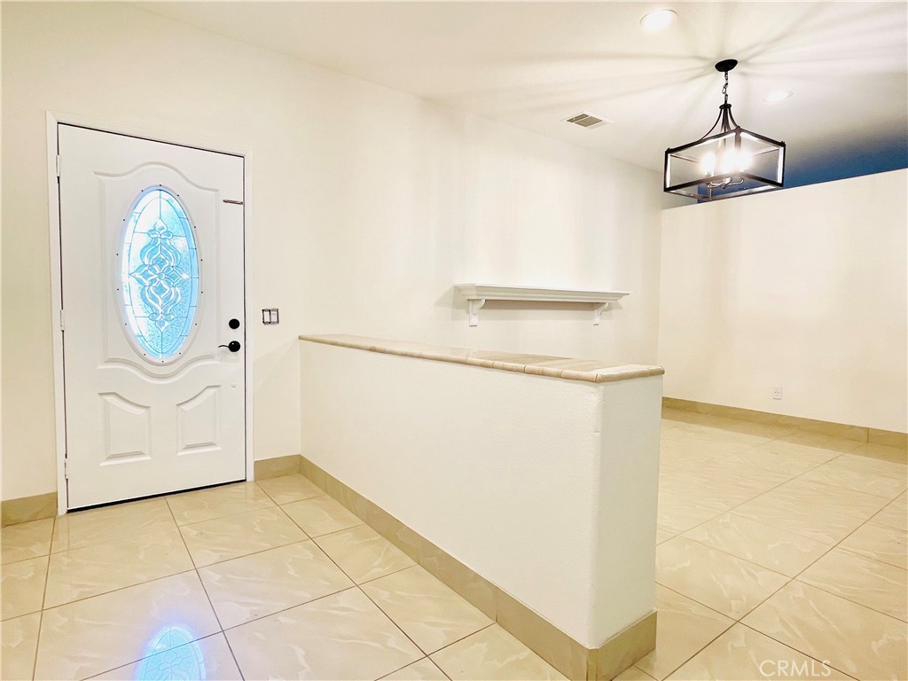 83107 Greenbrier Drive Indio, CA 92203 - Photo 6 of 29 a view of a storage & utility room with washer and dryer
