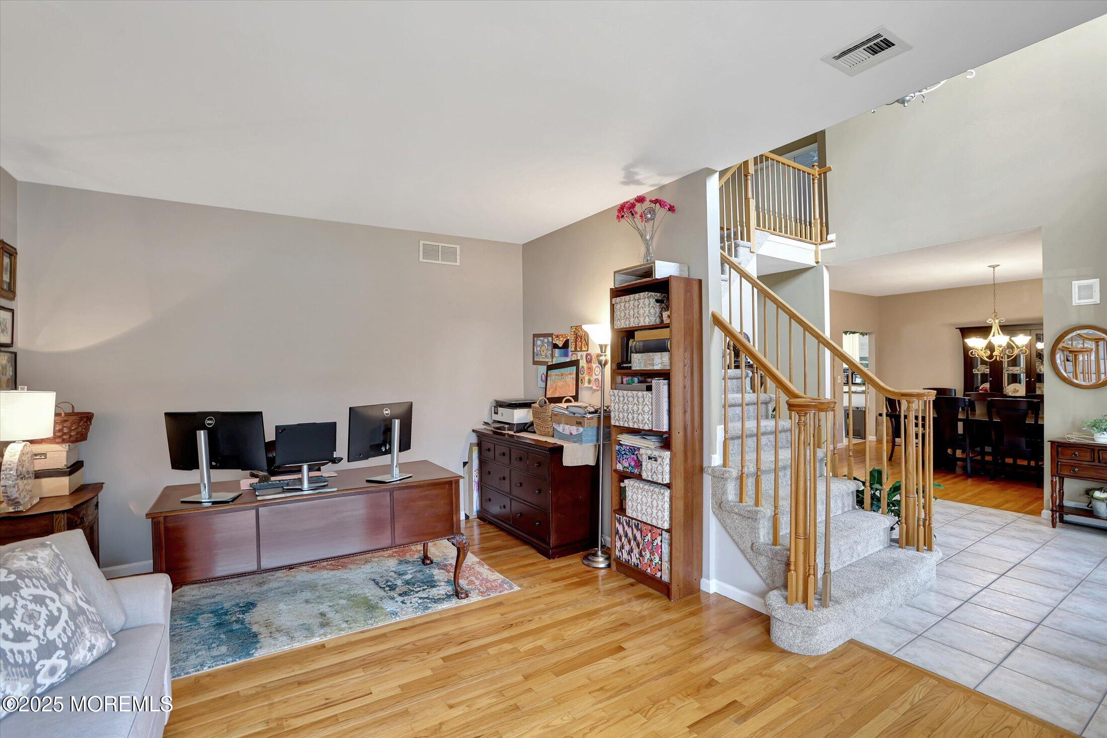 340 Meadowood Road Jackson, NJ 08527 - Photo 8 of 41 a living room with furniture and a wooden floor