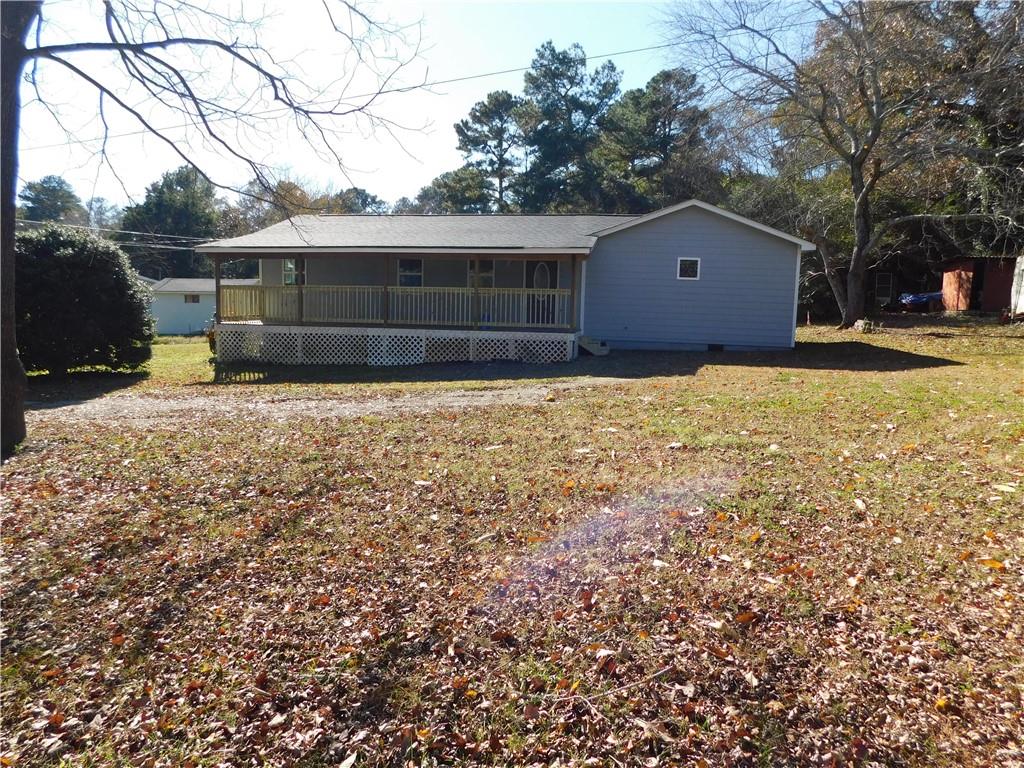 332 Newtown Road Northeast Calhoun, GA 30701 - Photo 1 of 1 a house view with a garden space