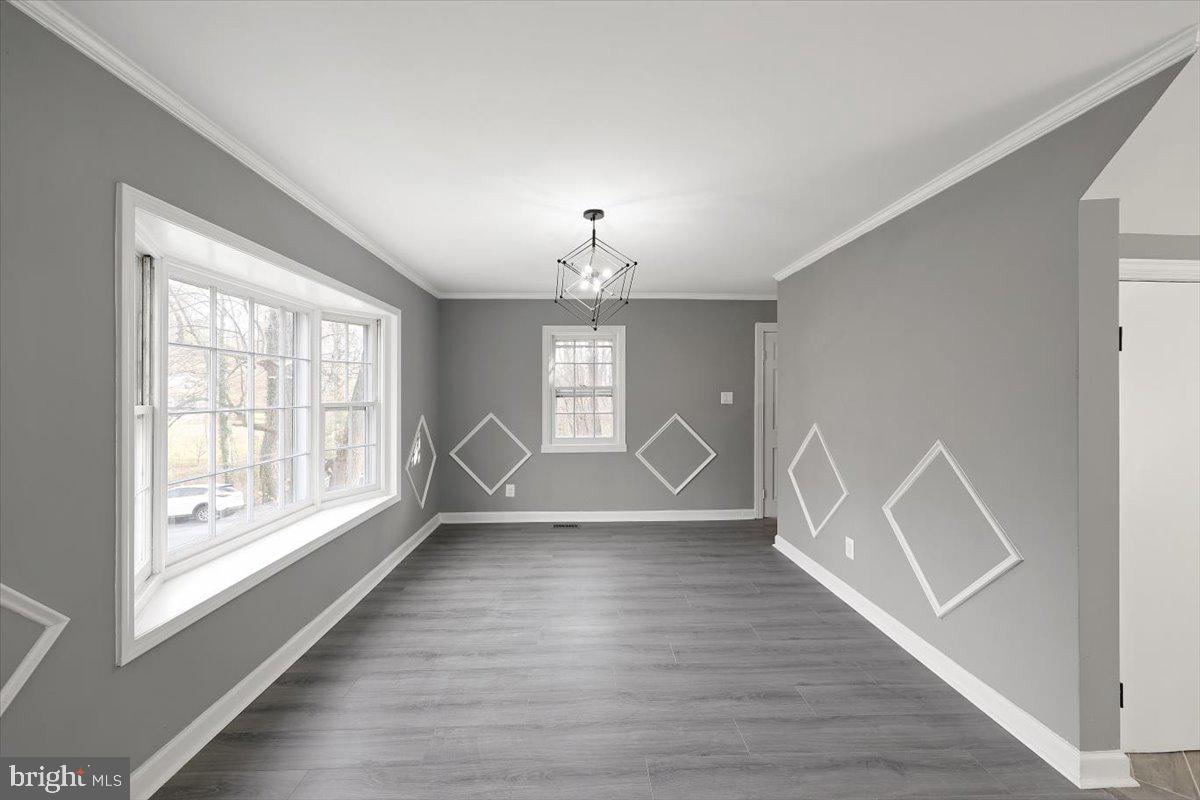 3140 Basford Road Frederick, MD 21703 - Photo 9 of 29 Formal dining room with large side windows