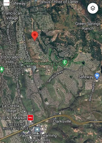 a view of a swimming pool with an outdoor seating