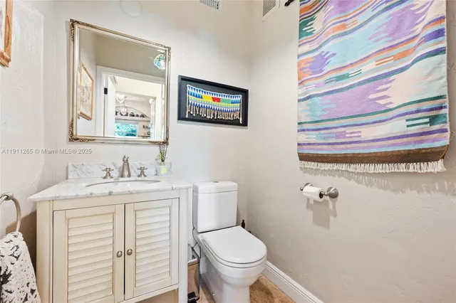 a kitchen with stainless steel appliances granite countertop a stove and a granite counter tops