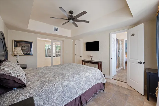 a street view with palm trees