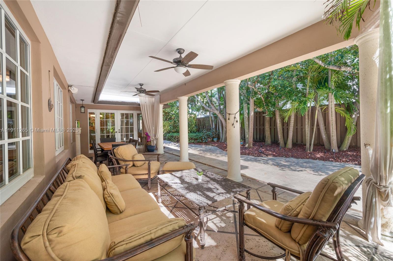 3308 Northeast 16th Place Fort Lauderdale, FL 33305 - Photo 26 of 31 a living room with furniture and a large window