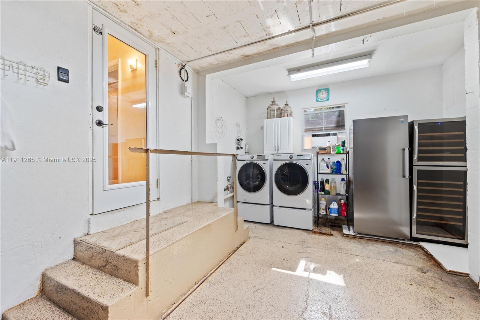 3308 Northeast 16th Place Fort Lauderdale, FL 33305 - Photo 27 of 31 a utility room with dryer and washer