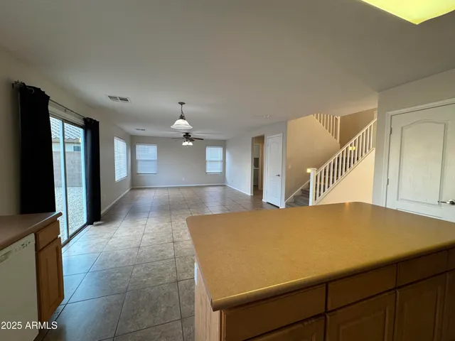 a view of livingroom with kitchen