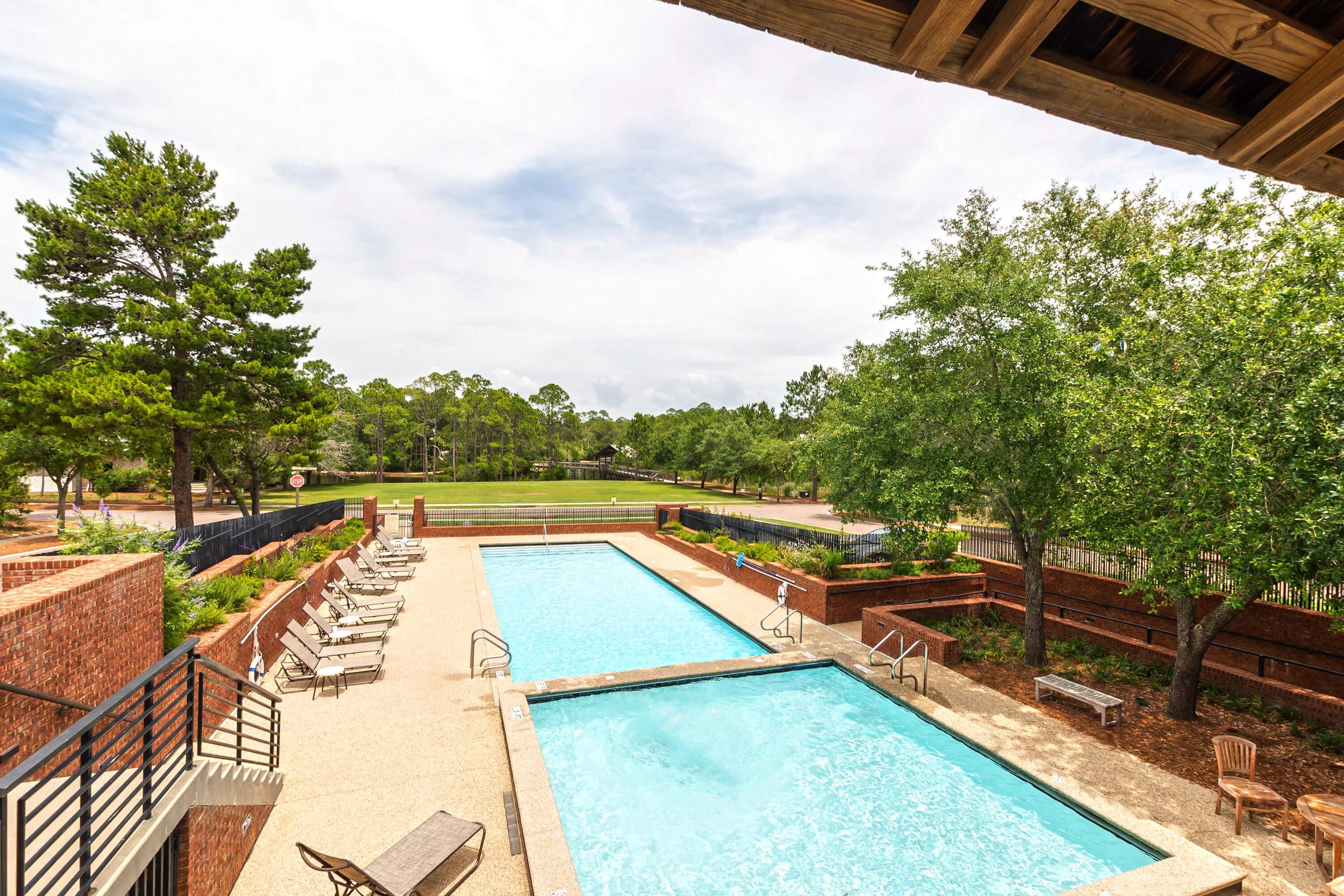 80 Okeechobee West Santa Rosa Beach, FL 32459 - Photo 26 of 38 a view of a swimming pool with a lounge chair