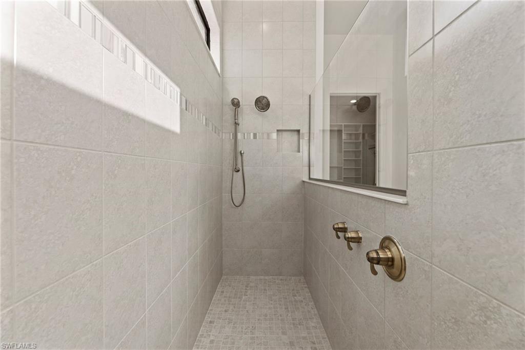 16140 Verilyn Circle Naples, FL 34110 - Photo 16 of 44 a bathroom with a shower