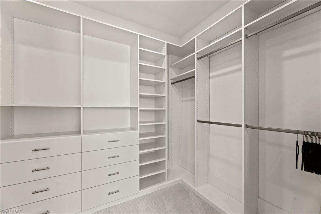 16140 Verilyn Circle Naples, FL 34110 - Photo 17 of 44 a view of an empty walk in closet