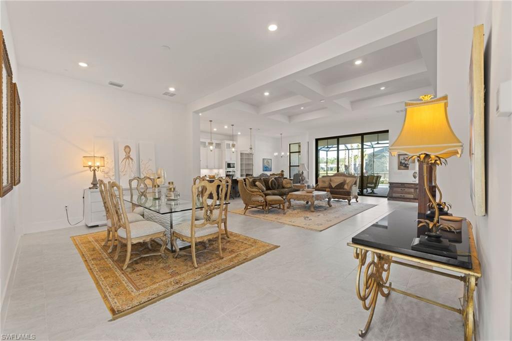 16140 Verilyn Circle Naples, FL 34110 - Photo 6 of 44 a view of a living room and dining room