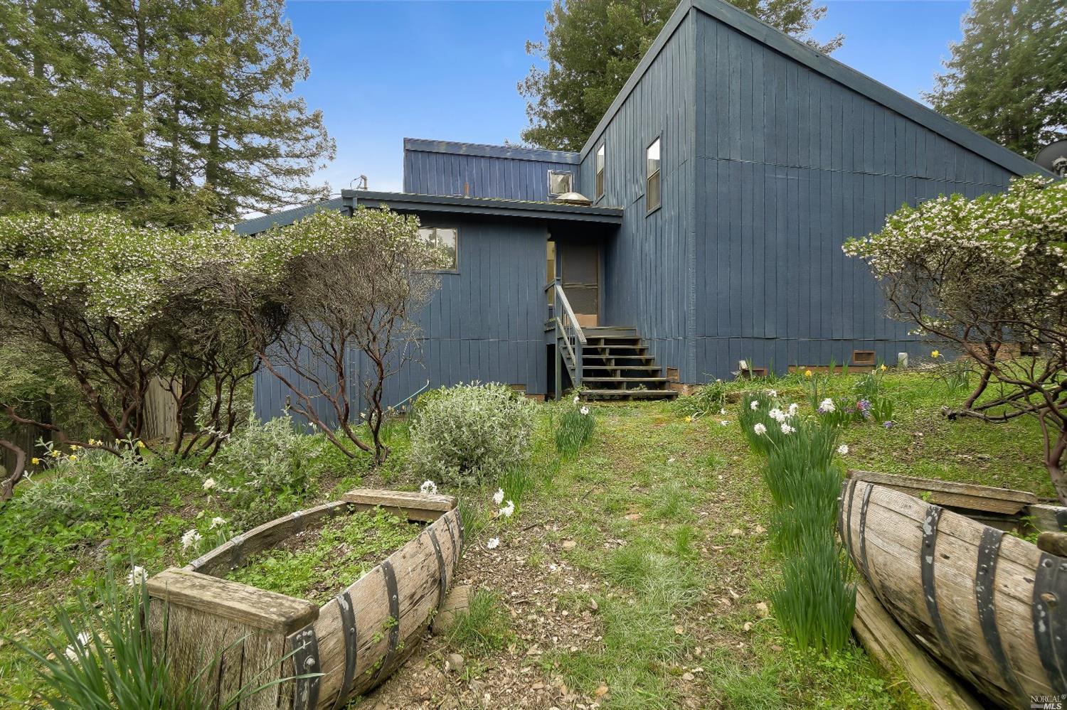 9003 Signal Ridge Road Philo, CA 95466 - Photo 1 of 1 a backyard of a house with lots of green space