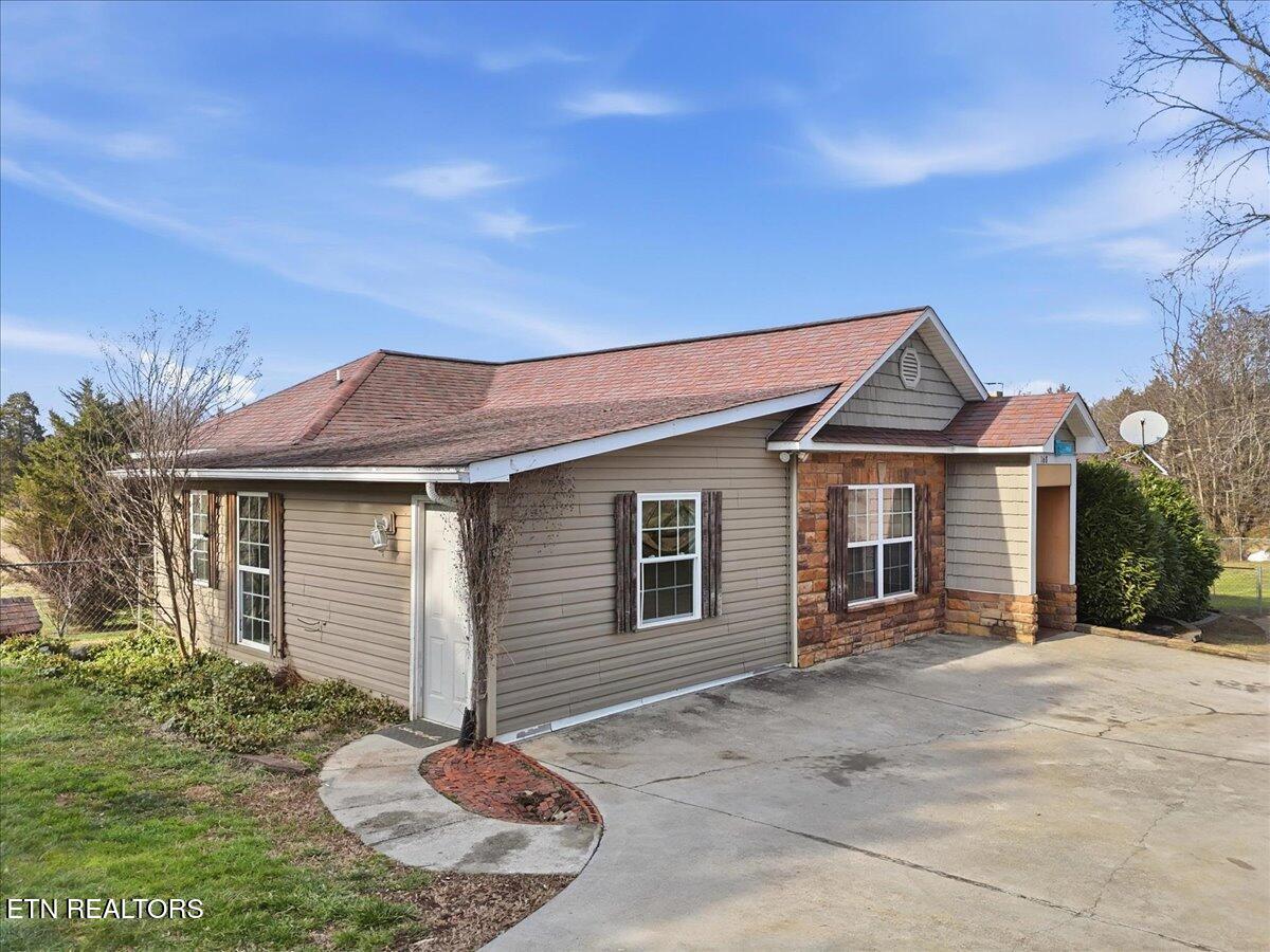 168 Corntassel Estates Road Vonore, TN 37885 - Photo 2 of 44 02-002_DJI_20260211154358_0703_D_autorem
