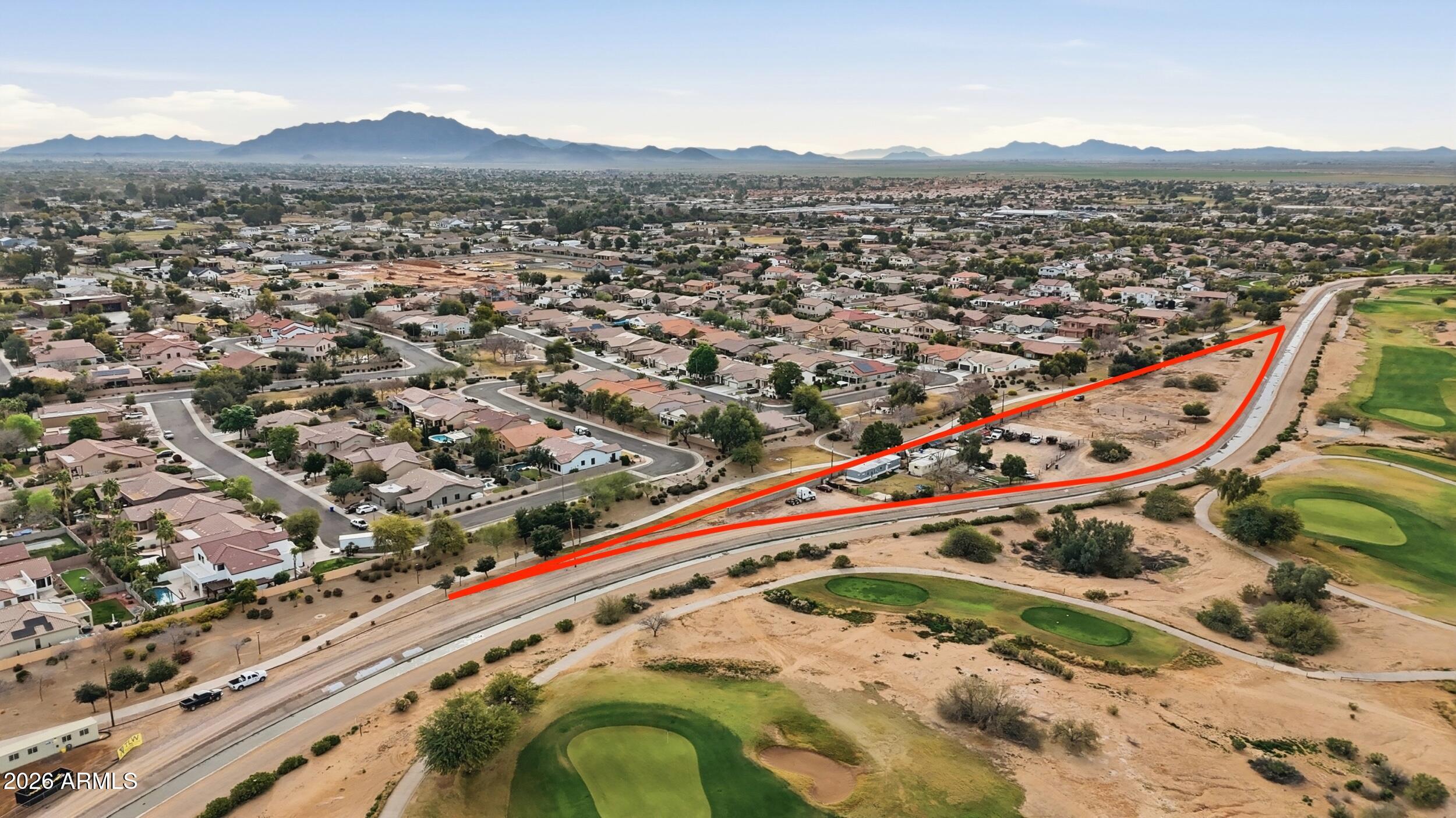 11739 East Chandler Heights Road Chandler, AZ 85249 - Photo 2 of 6 an aerial view of a tennis ground and a mountain view