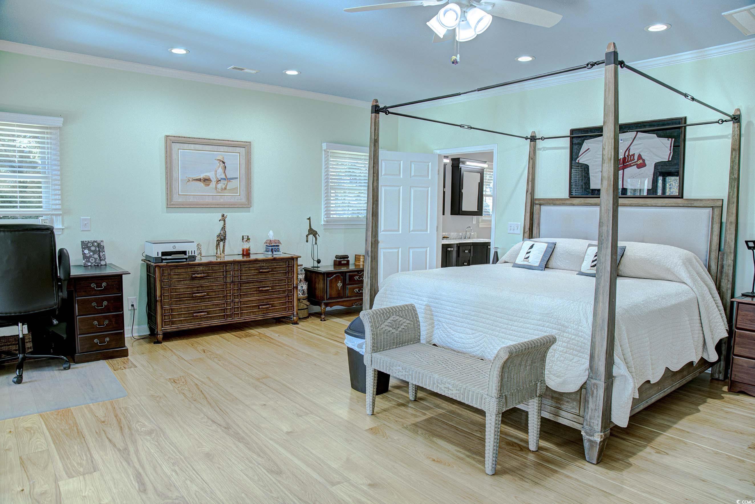 3637 Choppee Road Georgetown, SC 29440 - Photo 19 of 40 Bedroom with crown molding, recessed lighting, light wood-type flooring, and ceiling fan