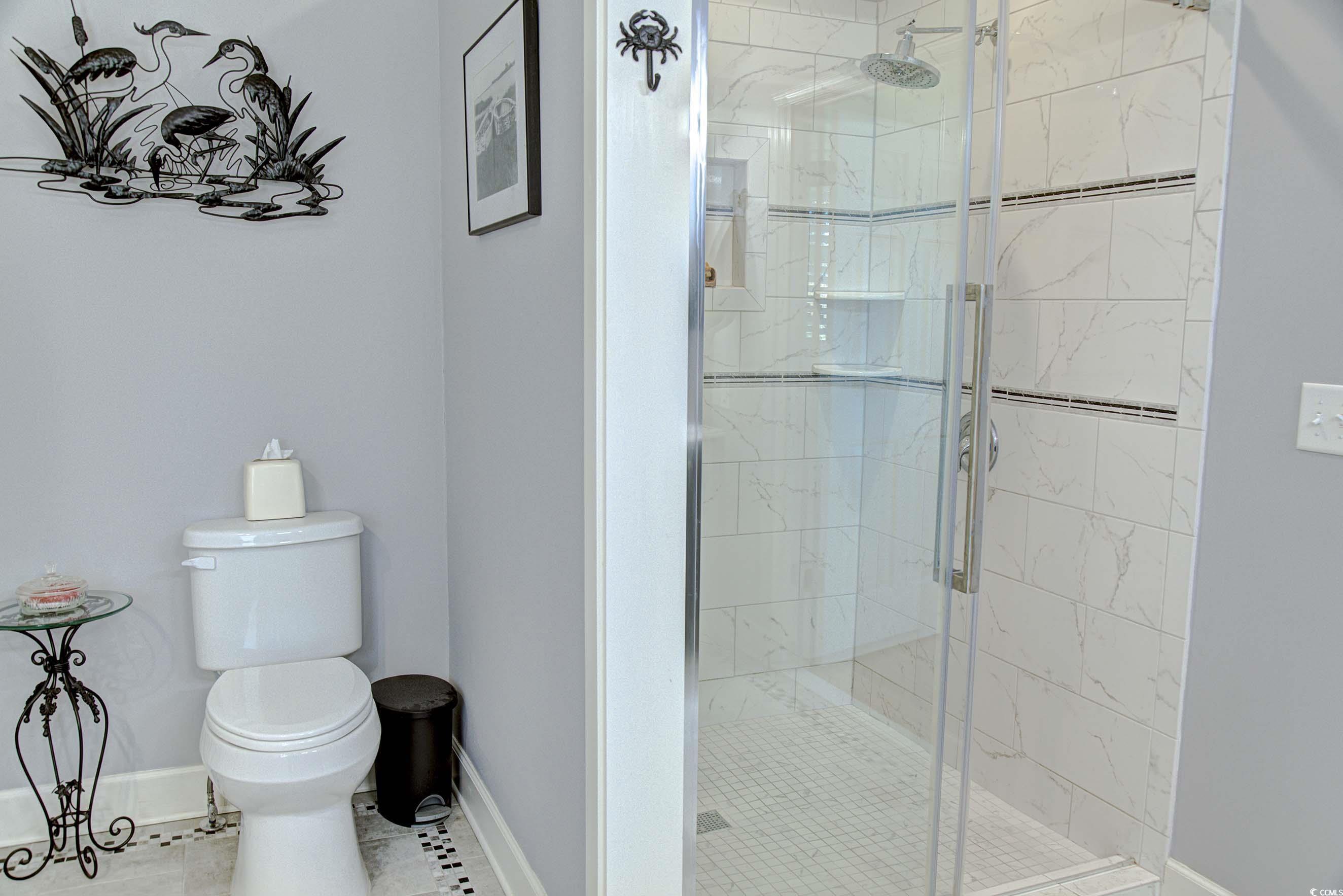 3637 Choppee Road Georgetown, SC 29440 - Photo 21 of 40 Bathroom with a shower stall and light tile patterned floors