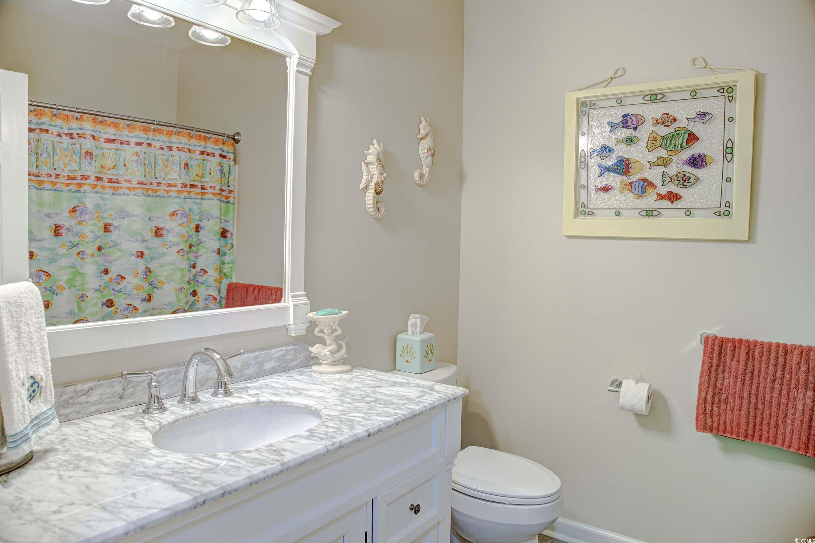 3637 Choppee Road Georgetown, SC 29440 - Photo 23 of 40 Bathroom with a shower with shower curtain and vanity