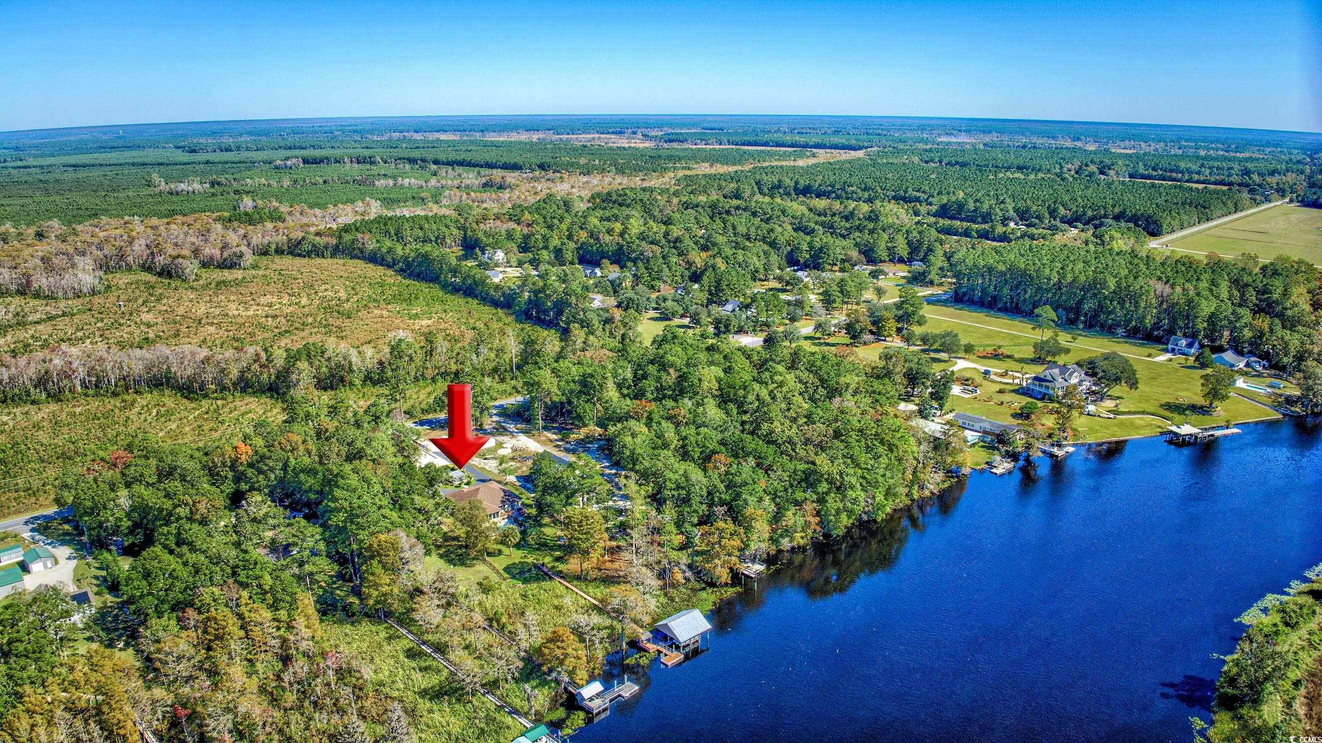3637 Choppee Road Georgetown, SC 29440 - Photo 38 of 40 Aerial view of property's location featuring a heavily wooded area and a nearby body of water