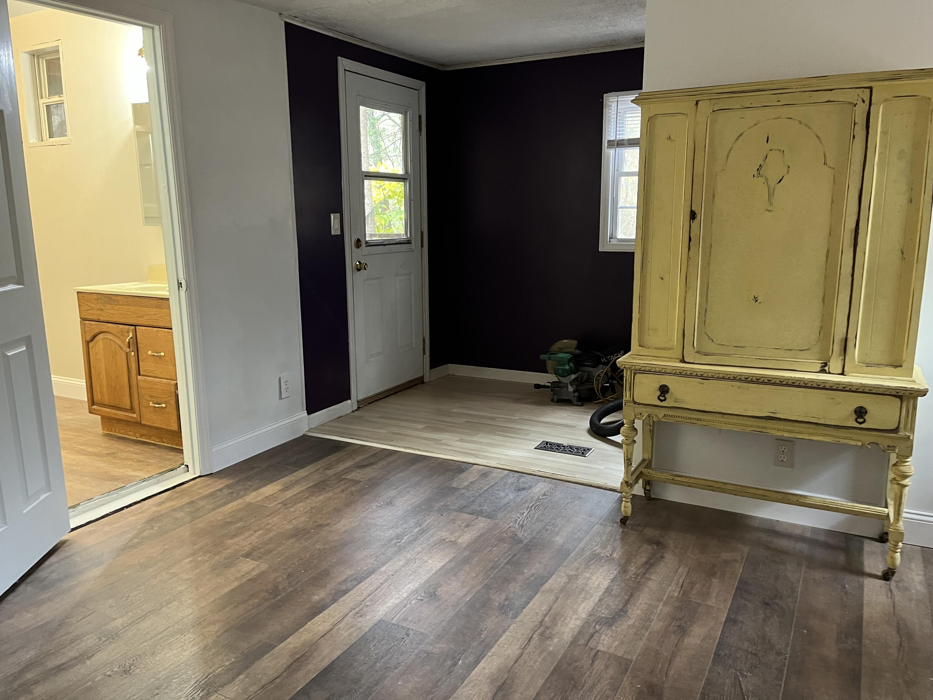 108 Meadowlark Road Blue Ridge, VA 24064 - Photo 13 of 14 a view of room with wooden floor and windows