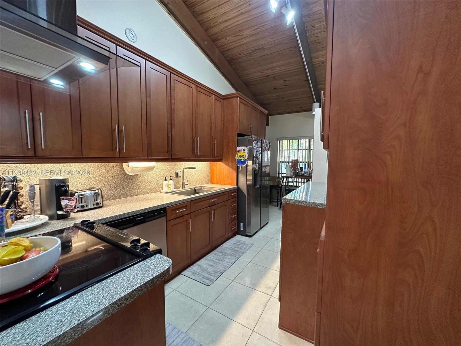3415 Freedom Drive Hollywood, FL 33021 - Photo 17 of 49 a kitchen with granite countertop lots of counter top space