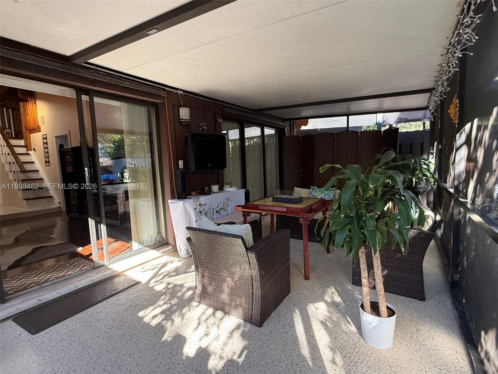 3415 Freedom Drive Hollywood, FL 33021 - Photo 9 of 49 a view of a porch with furniture