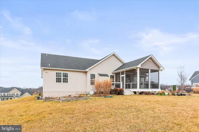 a picture of a room with a refrigerator
