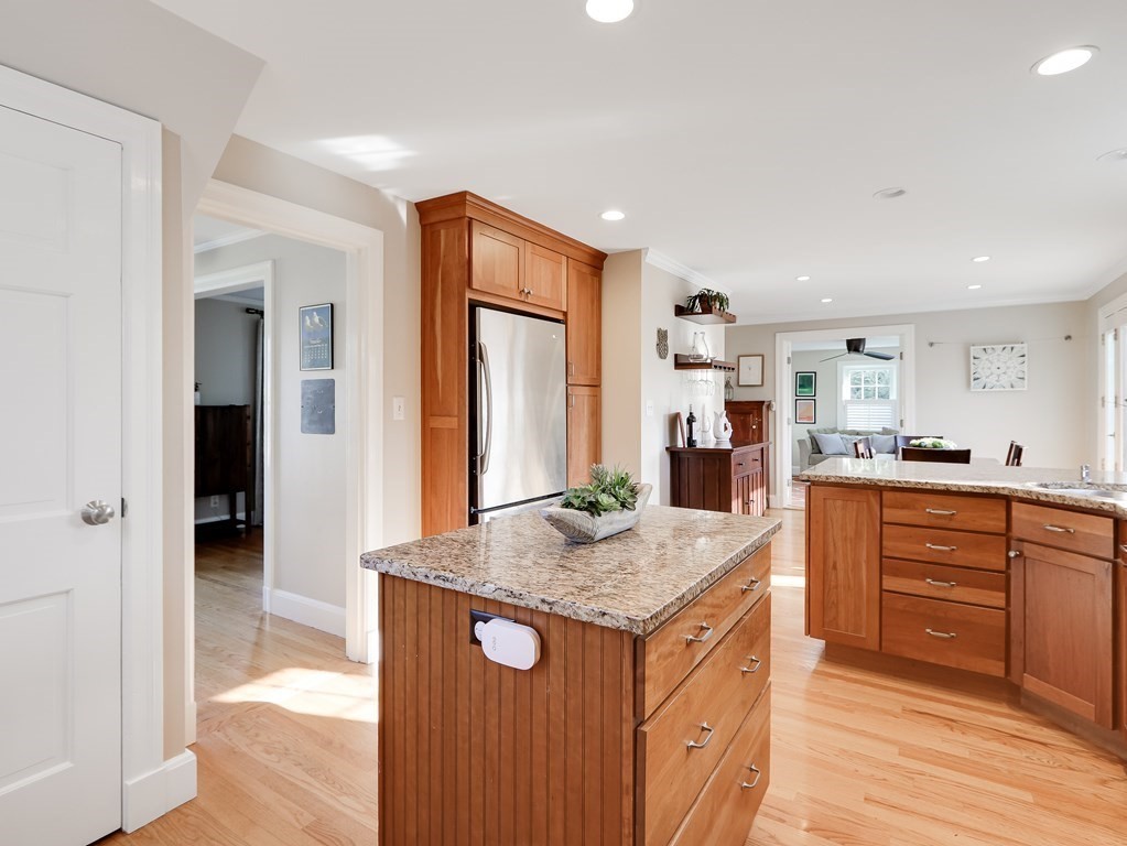 2 Central Terrace Needham, MA 02494 - Photo 11 of 33 a kitchen with granite countertop kitchen island sink stove and refrigerator