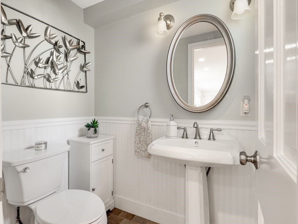 2 Central Terrace Needham, MA 02494 - Photo 12 of 33 a bathroom with a toilet a sink and a mirror