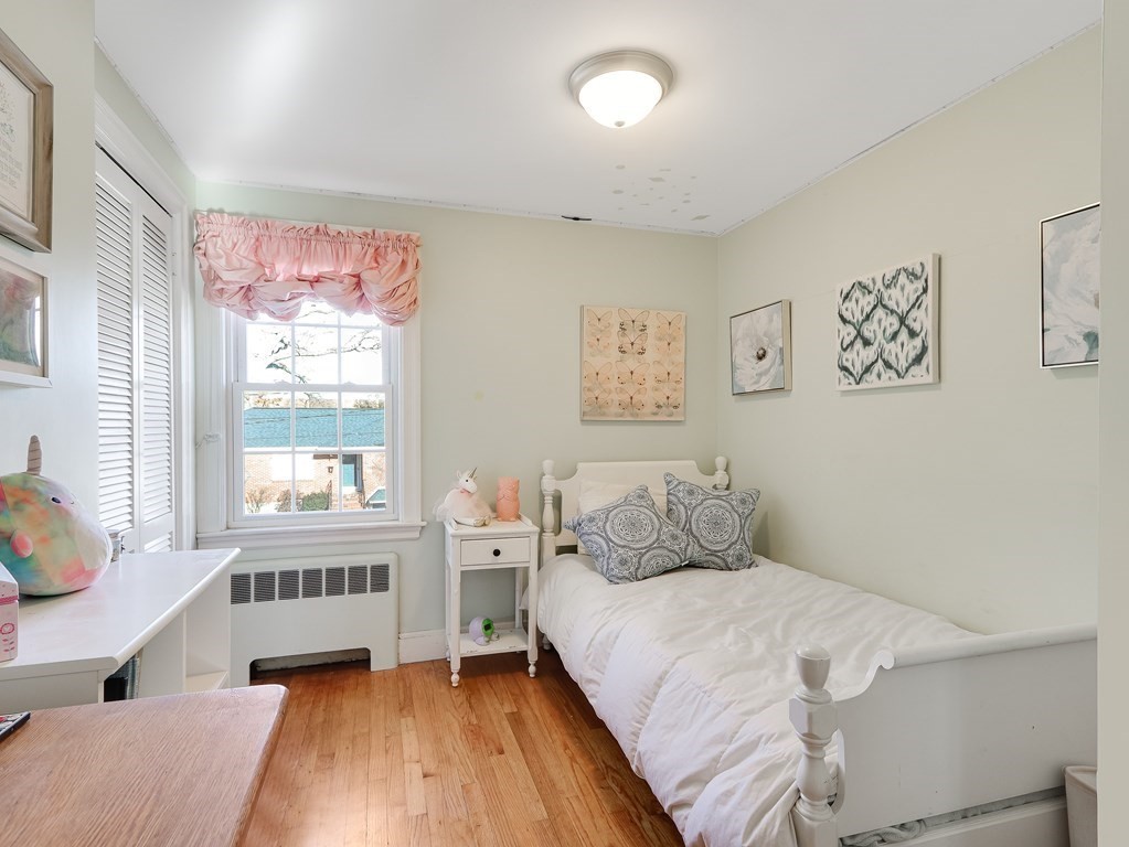 2 Central Terrace Needham, MA 02494 - Photo 15 of 33 a bedroom with a bed and a window