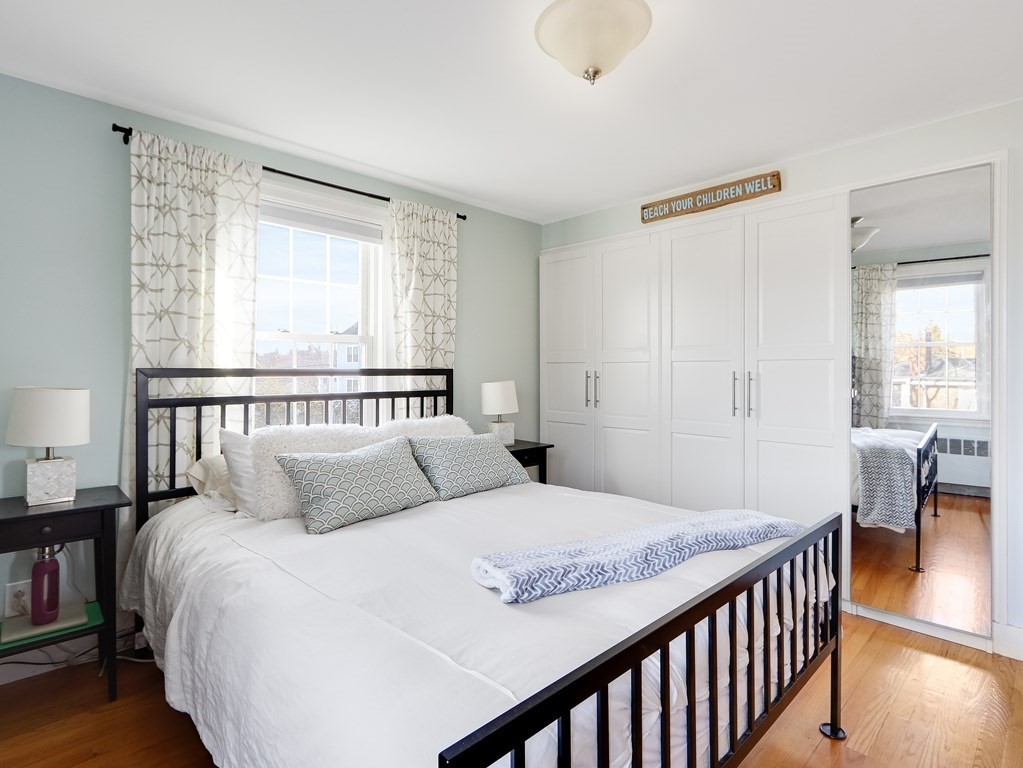 2 Central Terrace Needham, MA 02494 - Photo 17 of 33 a bedroom with a bed and a table