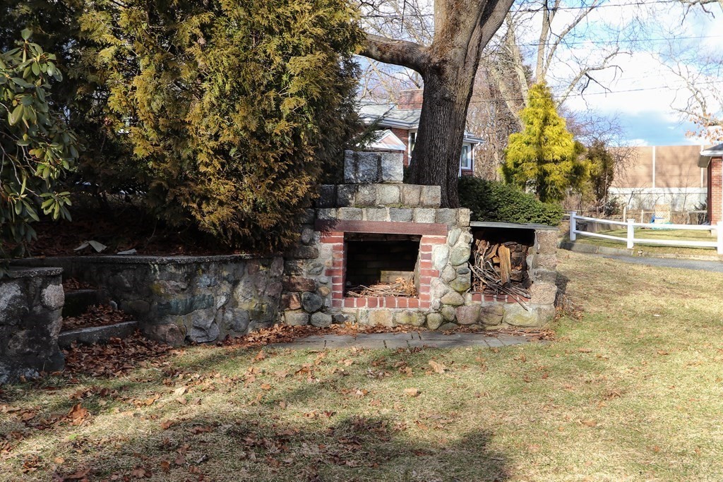 2 Central Terrace Needham, MA 02494 - Photo 28 of 33 a view of a yard with table and chairs