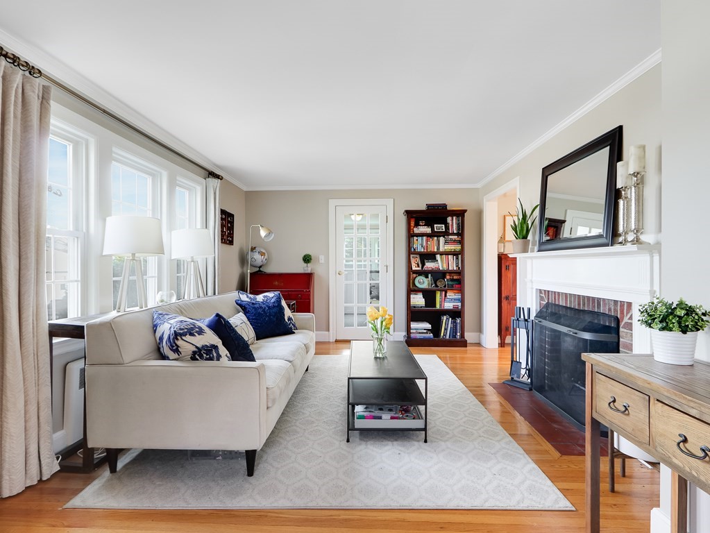 2 Central Terrace Needham, MA 02494 - Photo 3 of 33 a living room with furniture and a fireplace