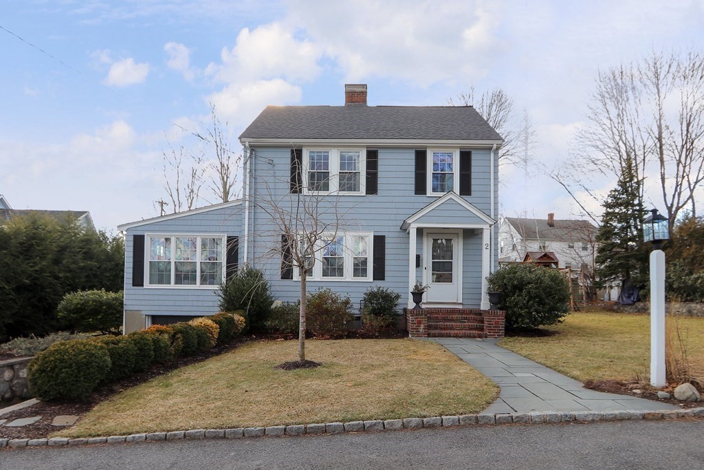 2 Central Terrace Needham, MA 02494 - Photo 31 of 33 a front view of a house with a yard and garage