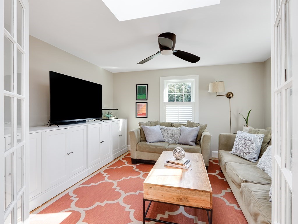 2 Central Terrace Needham, MA 02494 - Photo 6 of 33 a living room with furniture and a flat screen tv