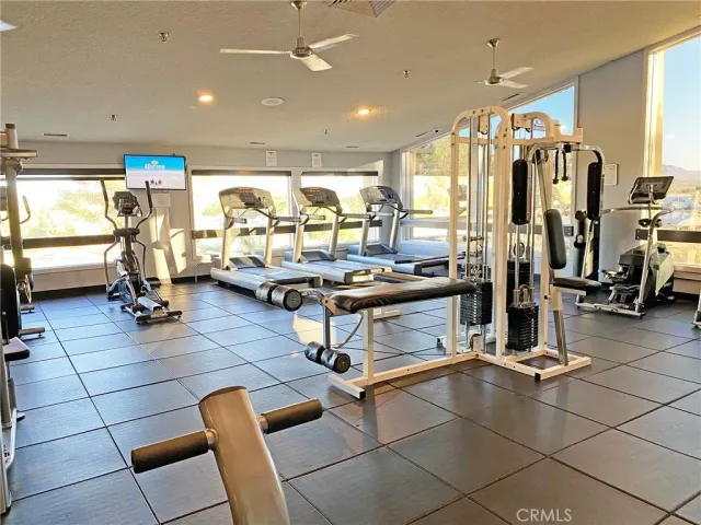 a view of a wooden deck and a yard