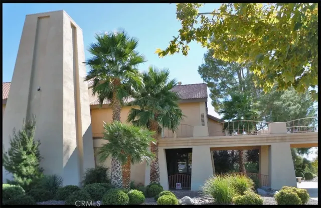 a kitchen with a table and chairs