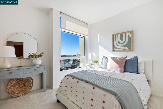 a bedroom with a bed and a fireplace