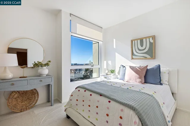 a bedroom with a bed and a fireplace