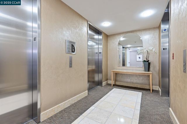 a bathroom with a double vanity sink toilet and shower