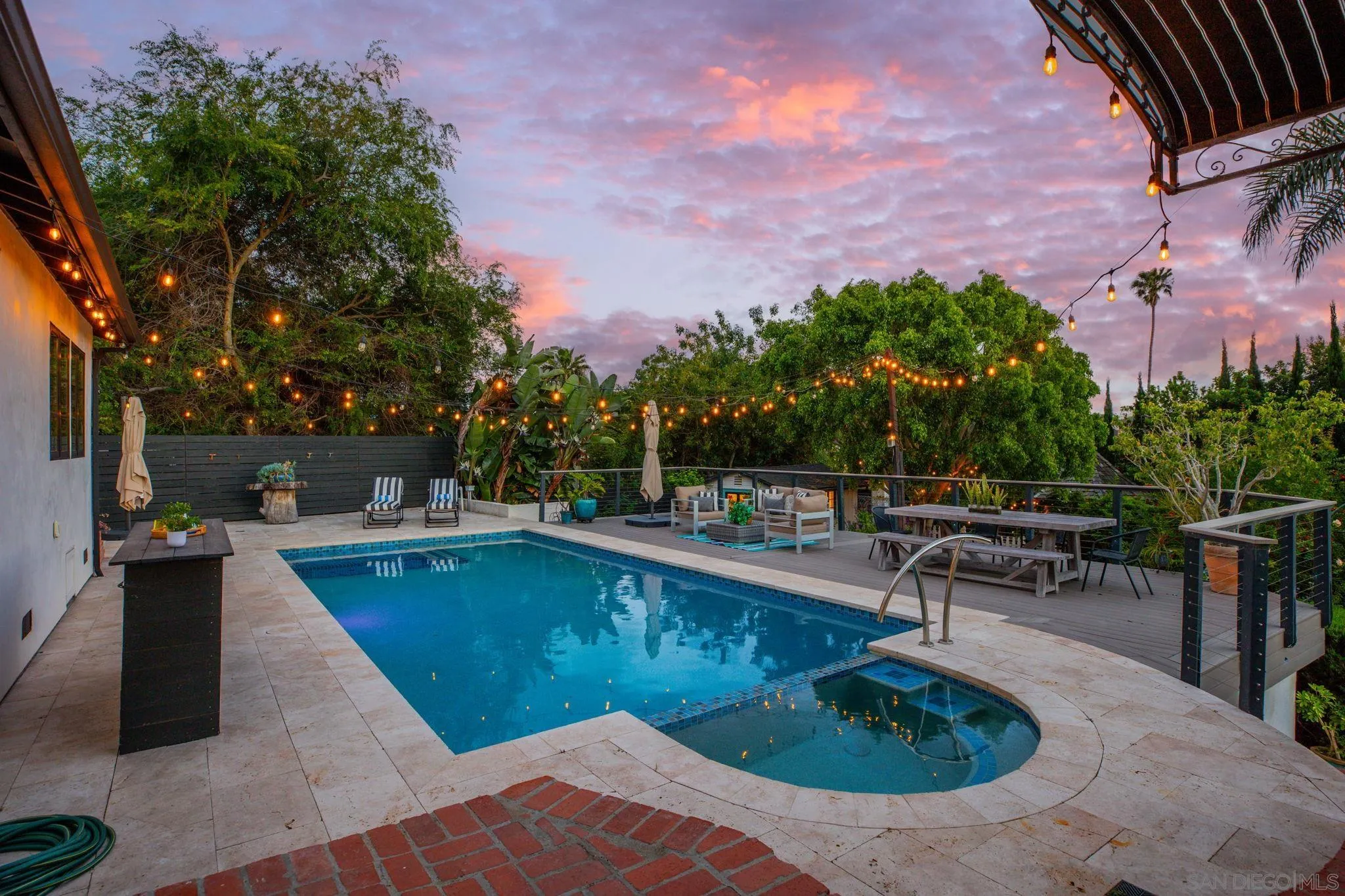 2335 Ivy Road Oceanside, CA 92054 - Photo 5 of 53 a view of a swimming pool with a patio