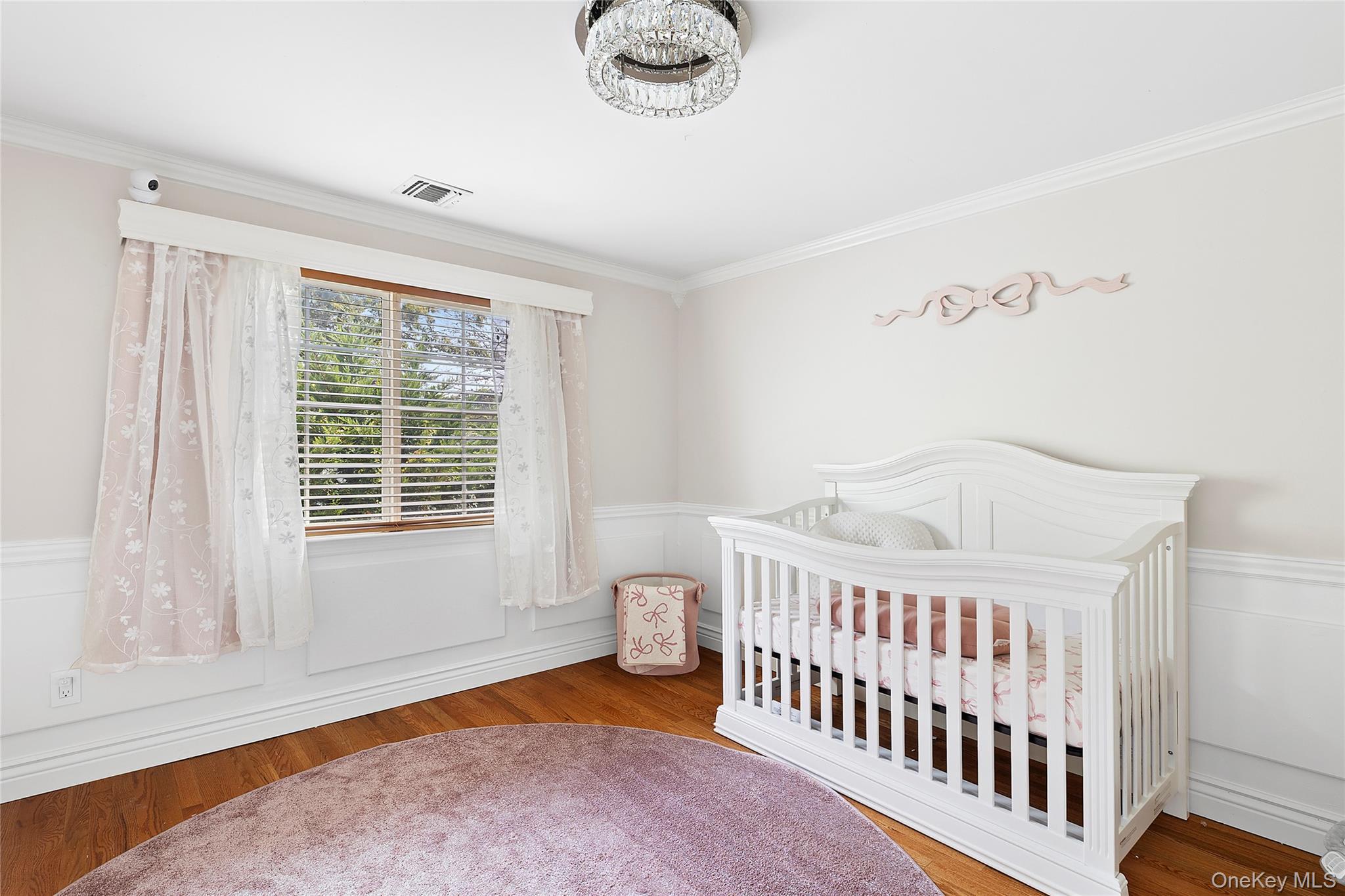 46 South Howell Avenue Centereach, NY 11720 - Photo 11 of 19 a bedroom with a bed and a window