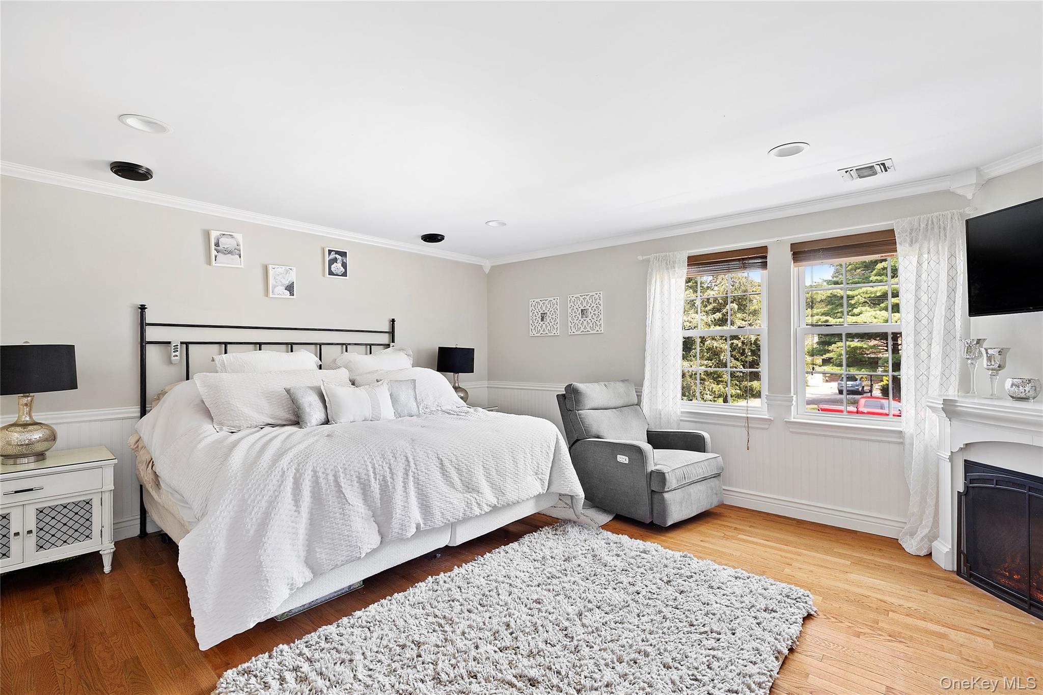 46 South Howell Avenue Centereach, NY 11720 - Photo 7 of 19 a bedroom with a bed and a window