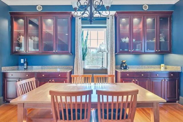 a view of a livingroom with furniture and windows