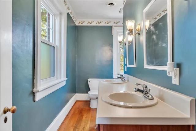 a view of a patio with a table and chairs