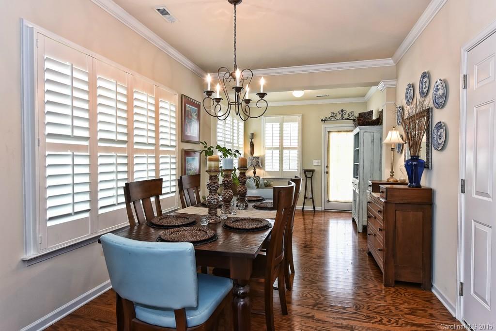 3446 Richard's Crossing Fort Mill, SC 29708 - Photo 7 of 15 a view of a dining room with furniture window and wooden floor