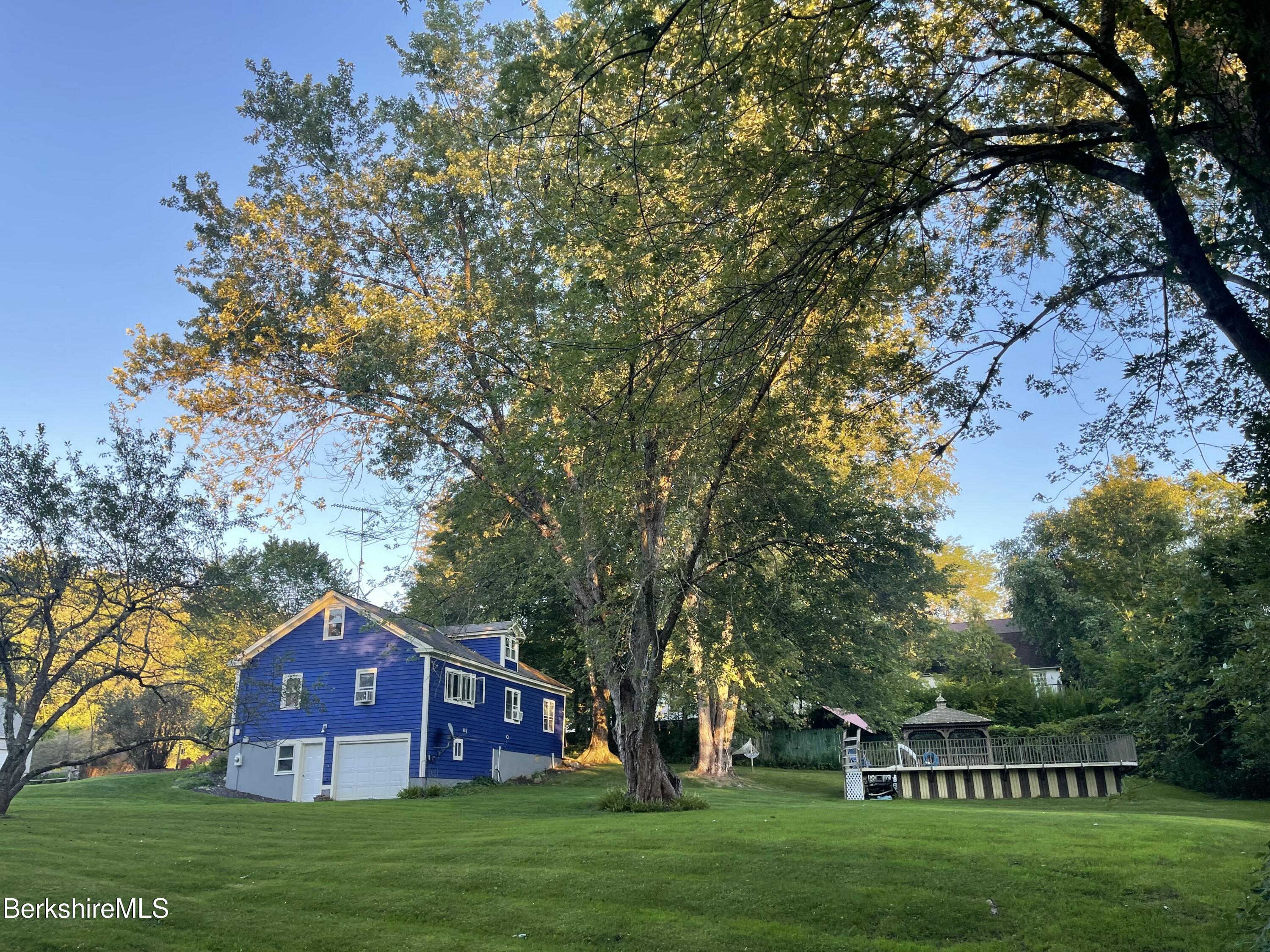117 Norfolk Road New Marlborough, MA 01259 - Photo 3 of 16 a view of house with outdoor space and garden