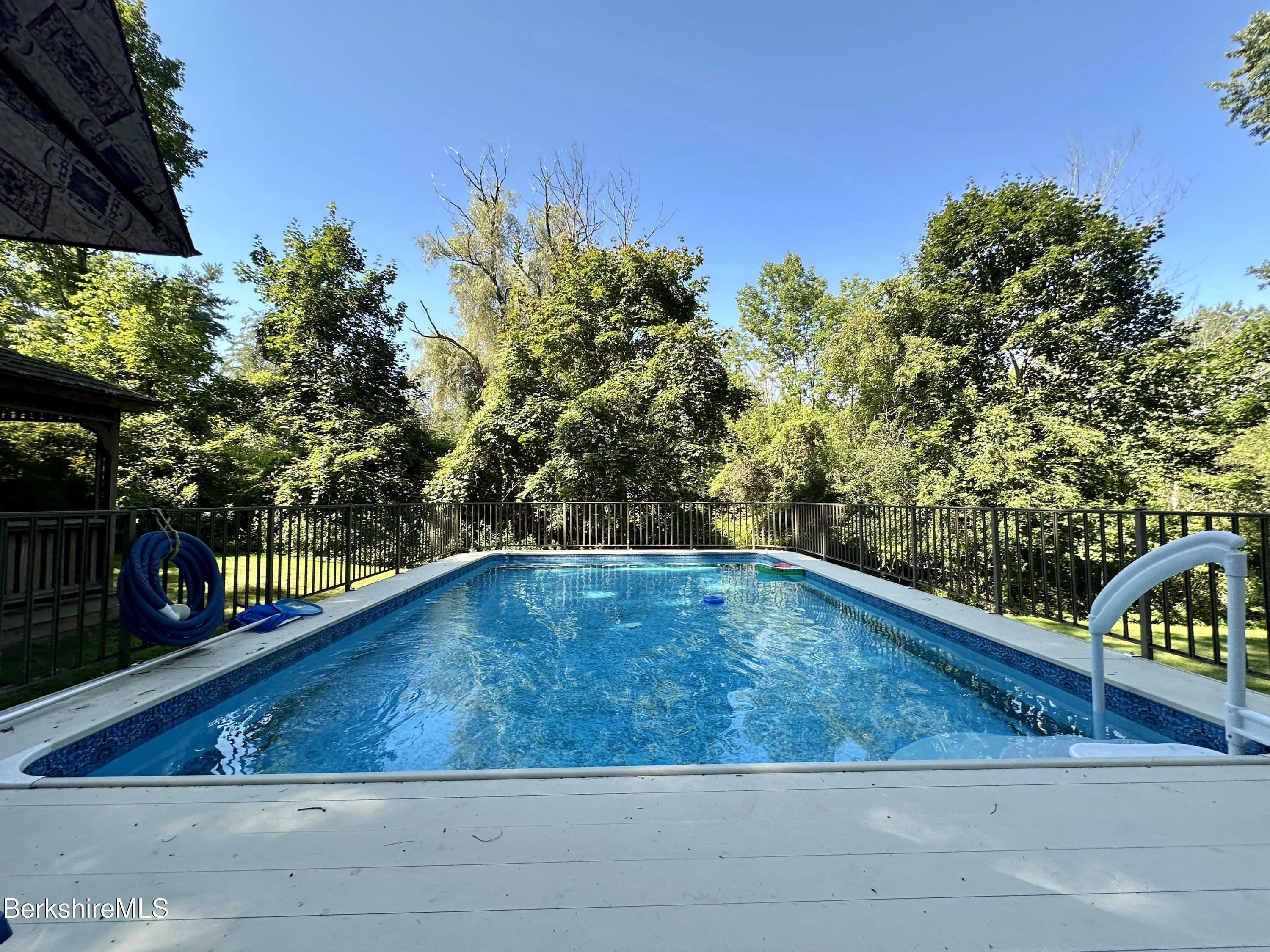 117 Norfolk Road New Marlborough, MA 01259 - Photo 5 of 16 a view of swimming pool from a balcony