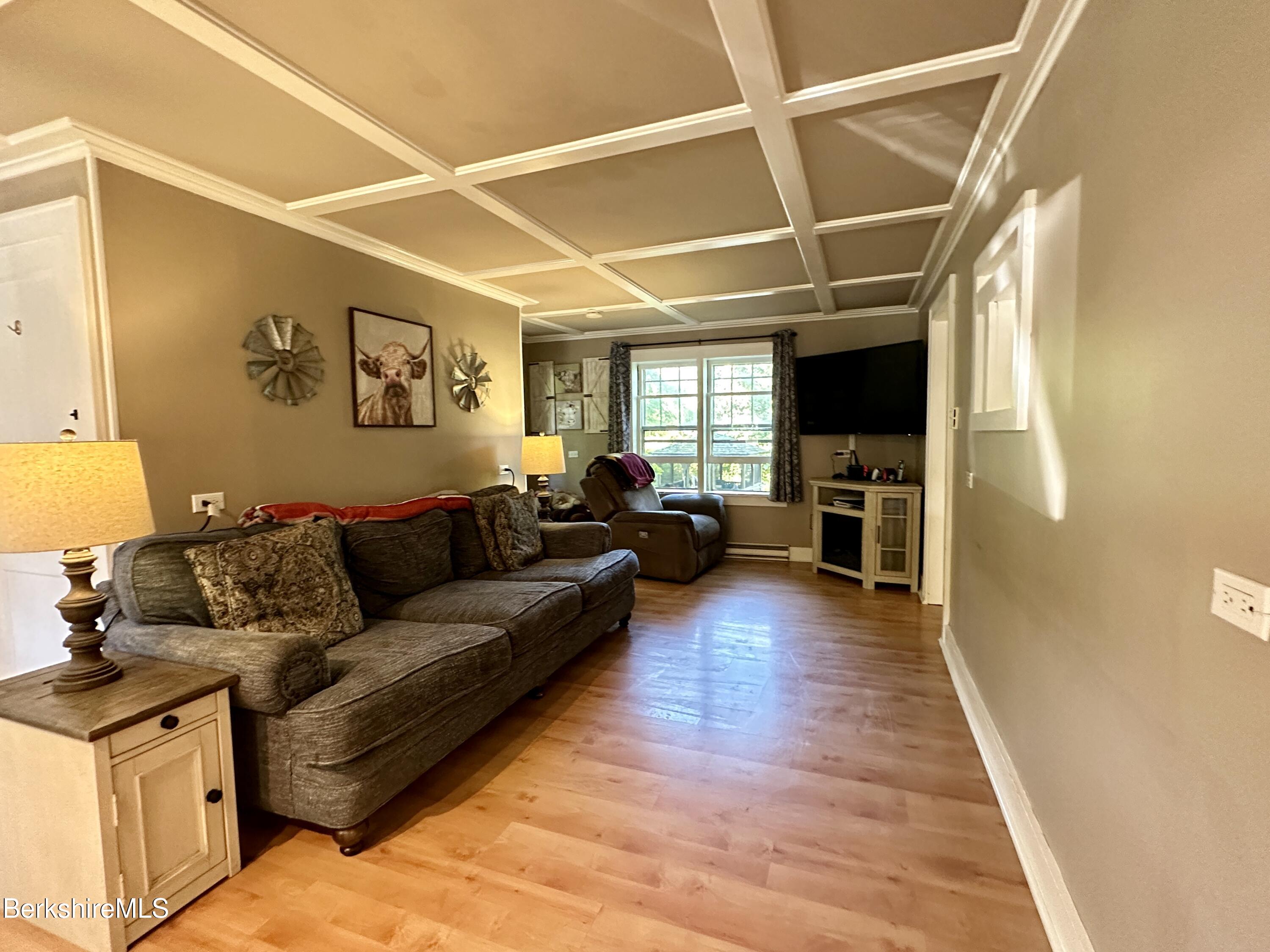 117 Norfolk Road New Marlborough, MA 01259 - Photo 7 of 16 a living room with furniture and a flat screen tv