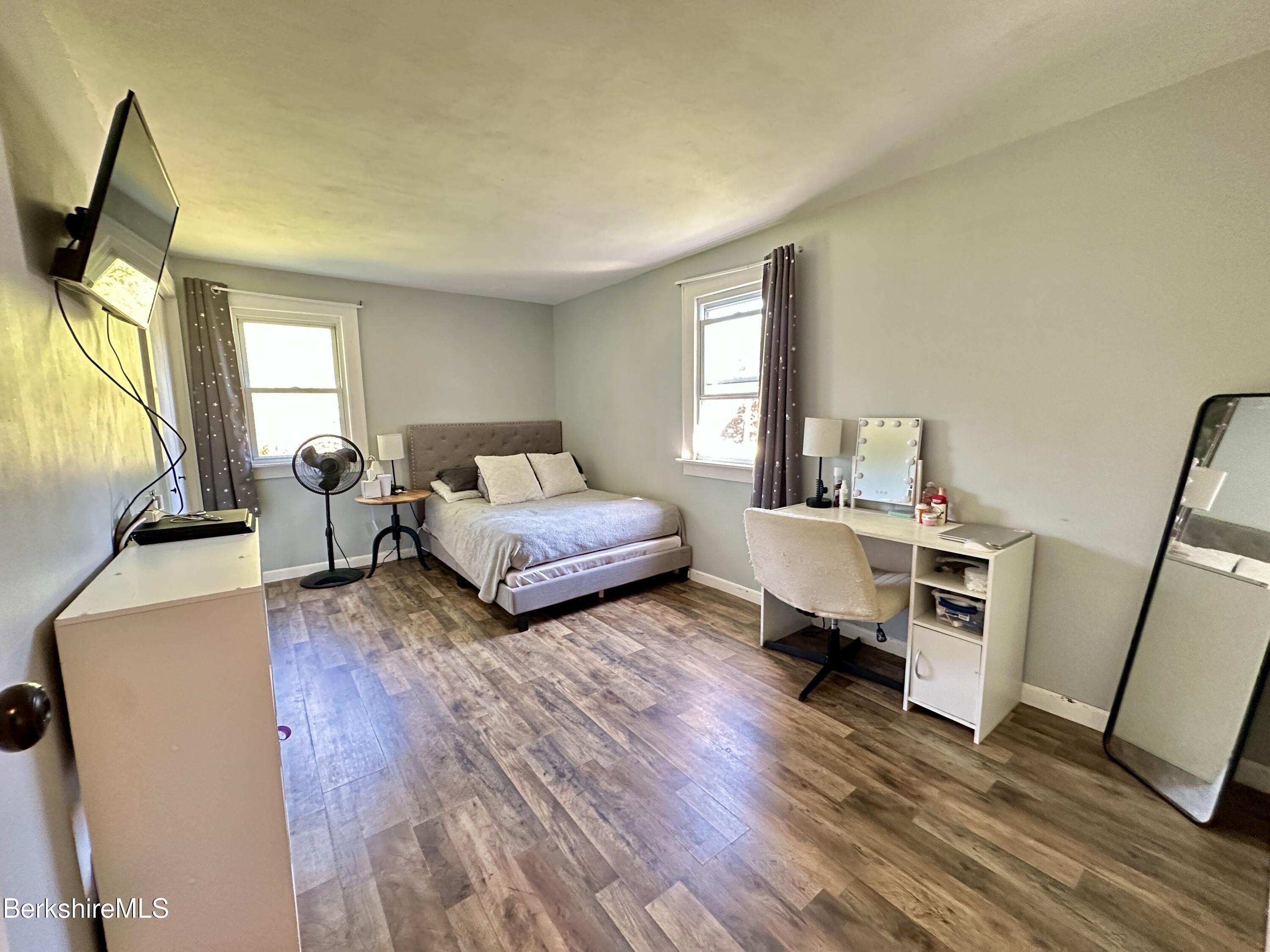 117 Norfolk Road New Marlborough, MA 01259 - Photo 10 of 16 a living room with furniture and a wooden floor