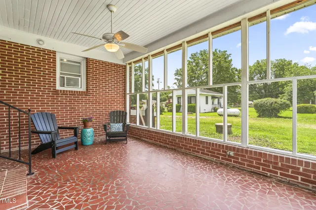 a kitchen with a stove a refrigerator and a stove top oven