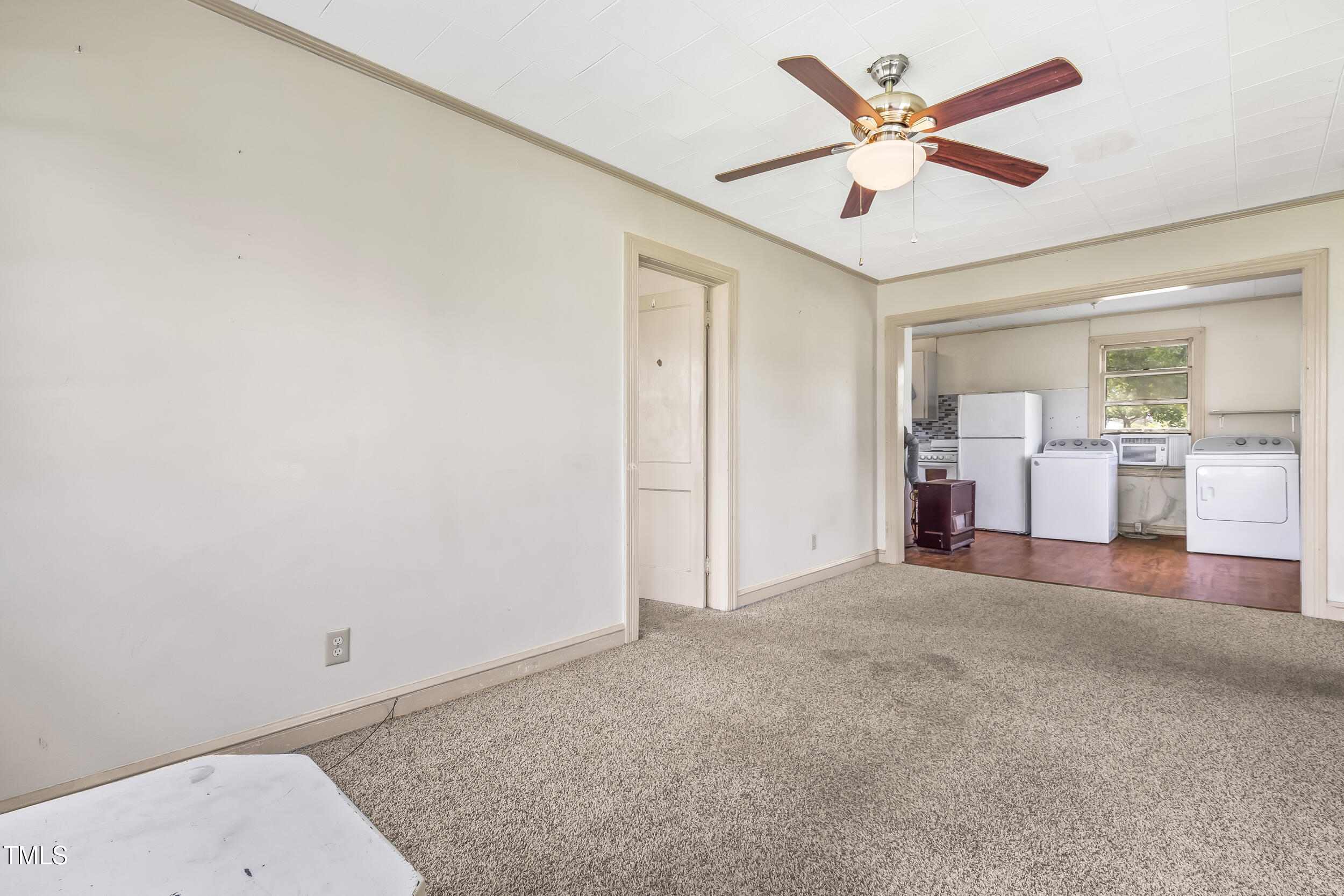 500 Rowan Road Clinton, NC 28328 - Photo 25 of 42 a view of a livingroom with wooden floor and a ceiling fan